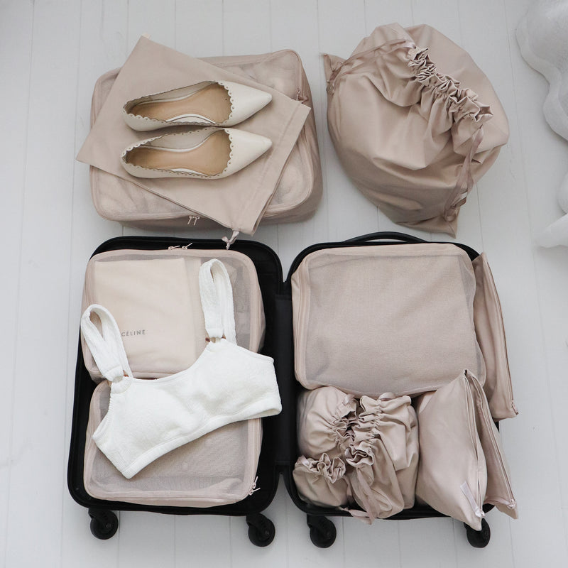Packing organizer in beige showing you how to pack your suitcase.