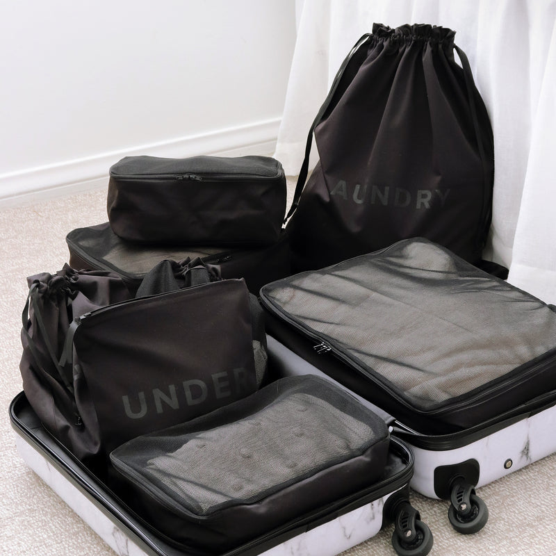 Example on how to pack with your Black All Star Set with packing bags and packing cubes