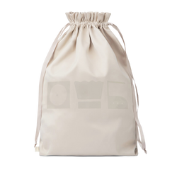 Large laundry bag for home and travel in the color beige