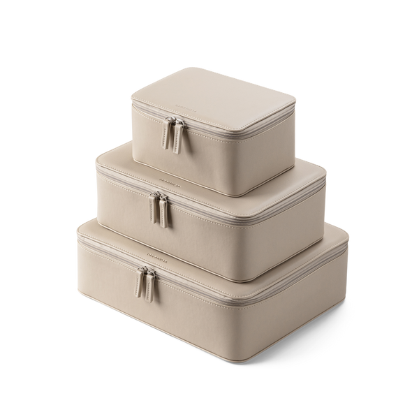 Vegan Leather Packing Cubes in the color beige - A trio on top of each other