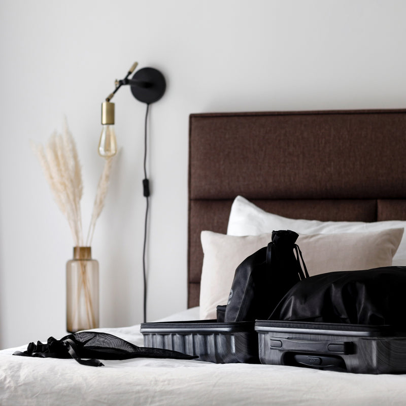 How to pack your suitcase - The All Star set in a suitcase on a bed